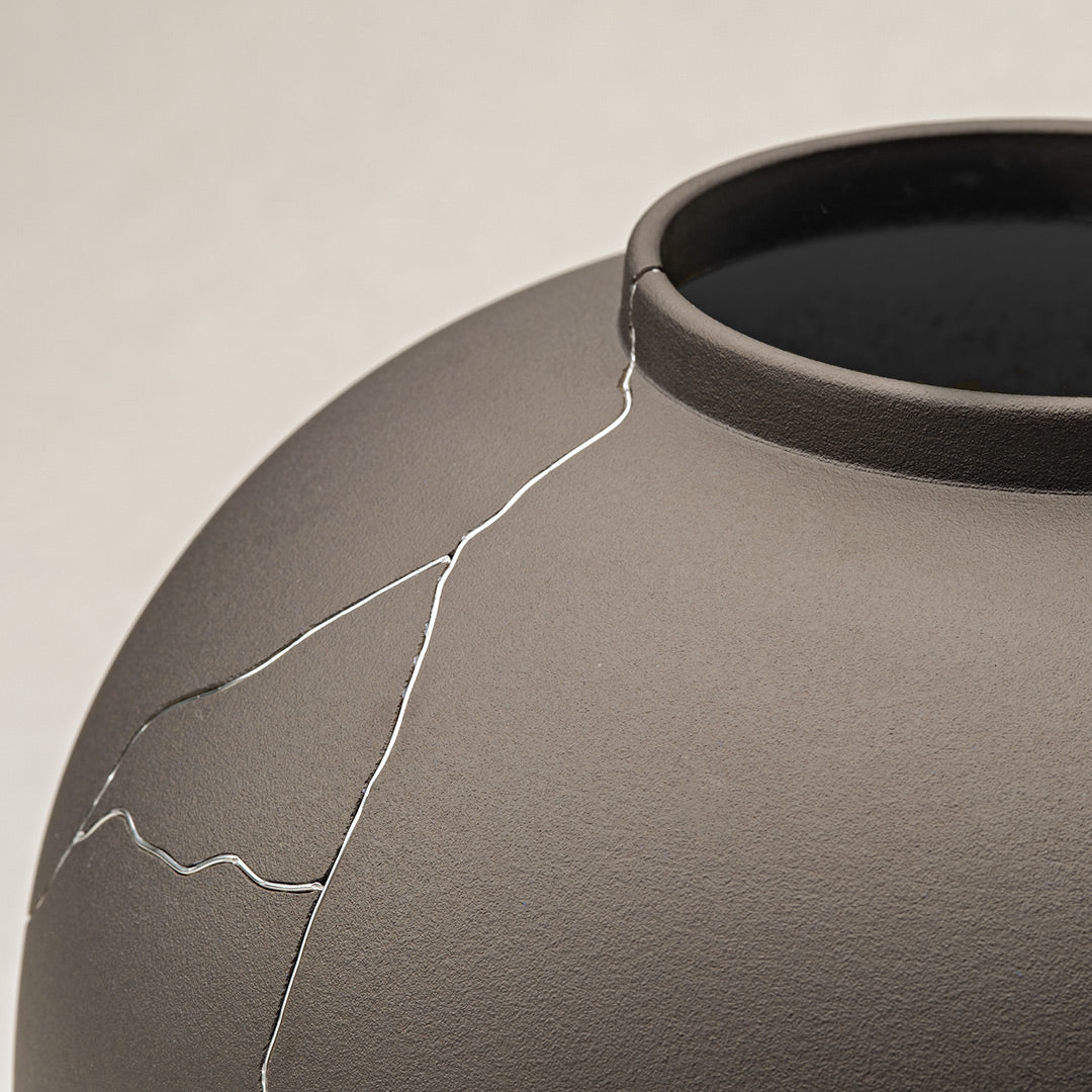 Dark Gray Ceramic Vase With Silver Crack Detailing, Ideal for Dining Table Or Shelf Decor.