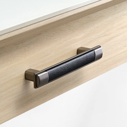 Eureka Ergonomic Ark Pro Desk Drawer Handle Detail. Black Leather Grip and Wood Grain Accent for Luxury Desk.