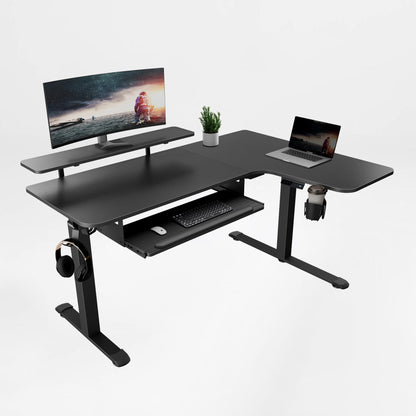 Eureka Ergonomic Black L-shaped standing desk with textured finish, monitor riser, laptop, pull-out keyboard tray, cup holder, headphone hook.