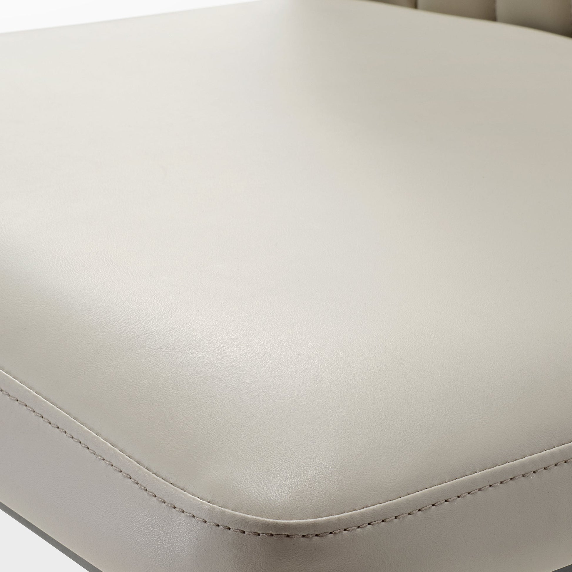 Off-White Leather Dining Chair Upholstery Detail With Stitching. Minimalist Design.