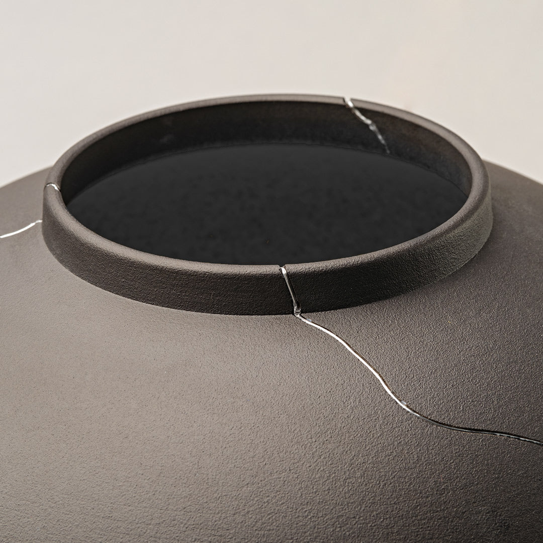 Dark Gray Ceramic Vase With Silver Crack Detailing, Perfect for Dining Table Or Shelf Decor.