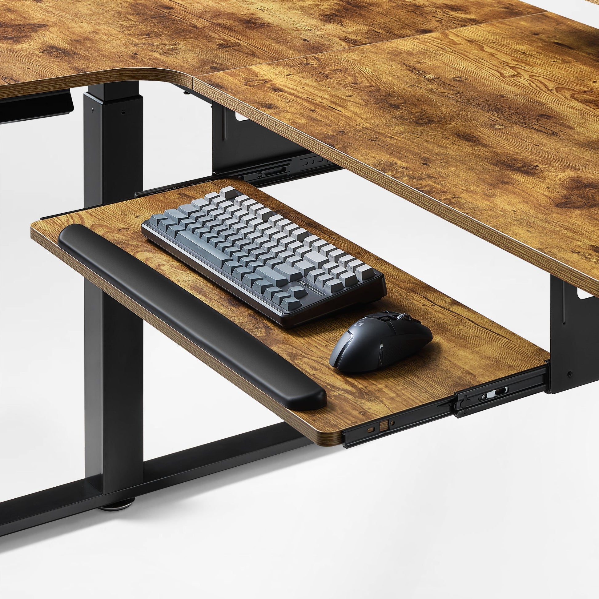 L-Shaped Standing Desk With 29-Inch Keyboard Tray and Wrist Rest, Maple Finish, Ergonomic Workspace.