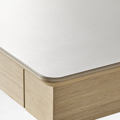 Eureka Ergonomic Ark Pro Desk Detail: White Sintered Stone Top, Wooden Accents, Height-Adjustable Design.