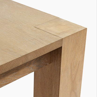 Edora Oak Dining Table Detail, Oak Veneer, Close-Up of Wood Grain and Joint.