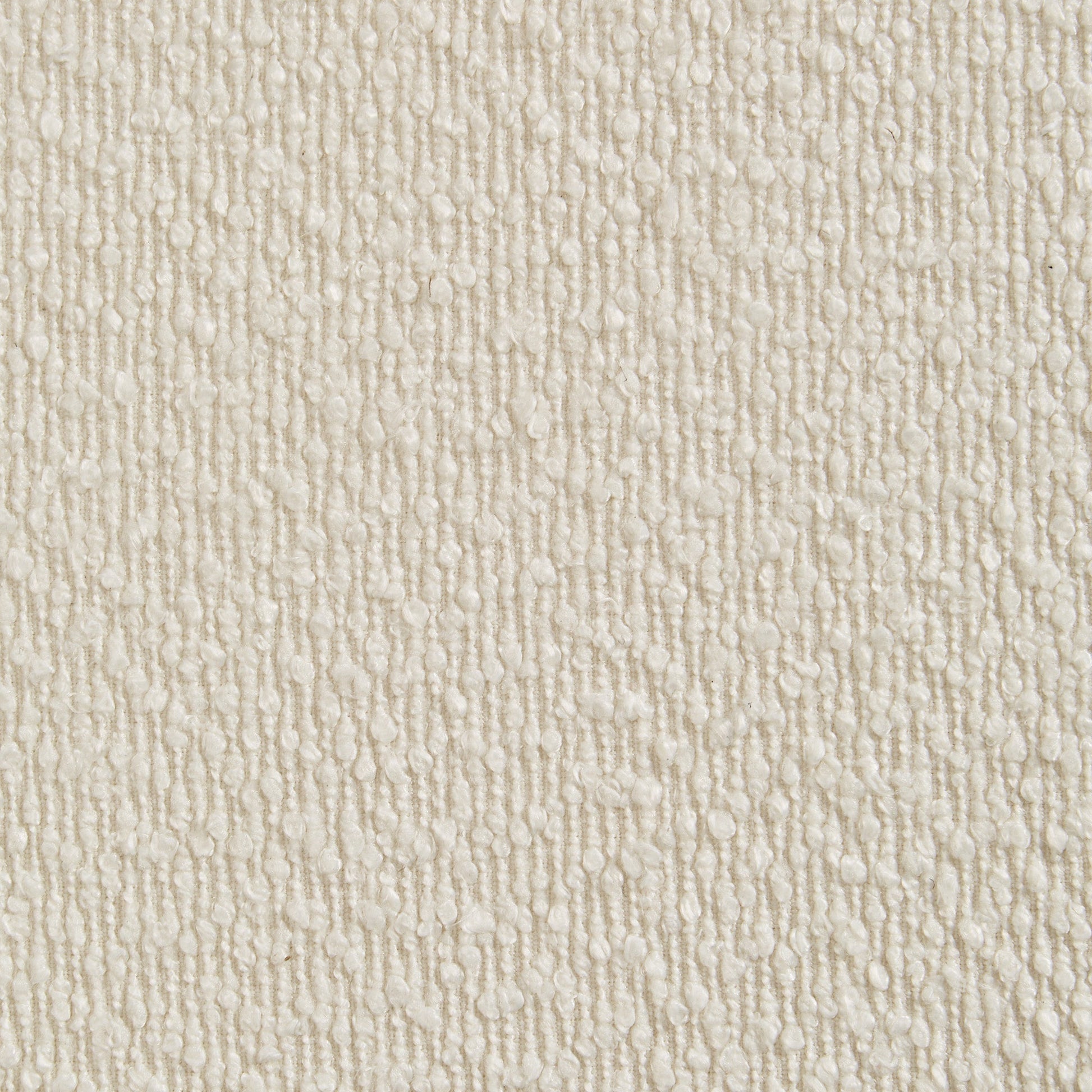 Eureka Ergonomic Close-up of ivory bouclé fabric texture with looped pile on a cream background, showcasing the tactile weave.