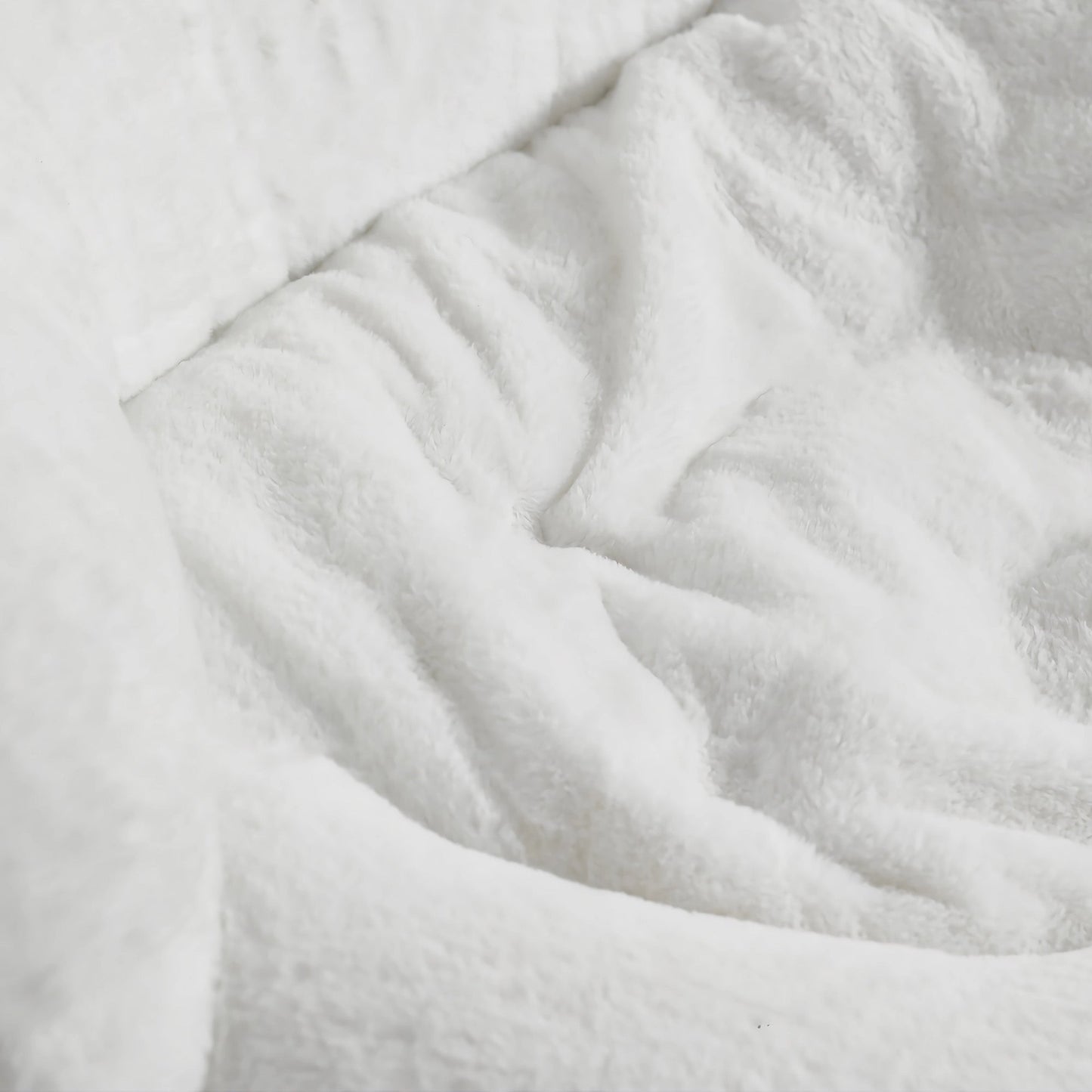 Gloria Swivel Lounge Chair, White Faux Fur Seat Detail.